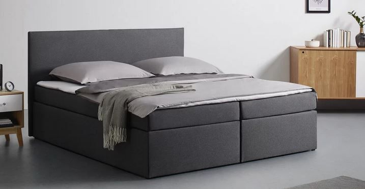 Bessagi Lucy 2 graues Boxspringbett ca. 180x 200cm inkl. Topper für 568€ (statt 749€)