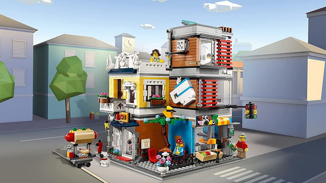 LEGO 31097 Creator Stadthaus mit Zoohandlung & Café für 56,90€ (statt 63€)