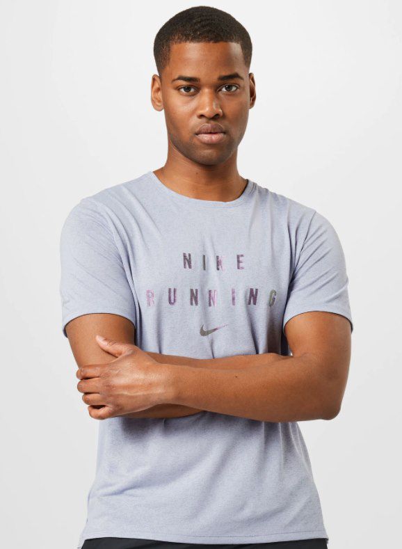 Nike Herren Sportshirt in Lila oder Royalblau für 16,73€ (statt 28€)