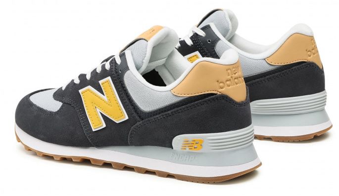 New Balance ML574NA2 in Dunkelblau/Gelb für 55€ (statt 67€)