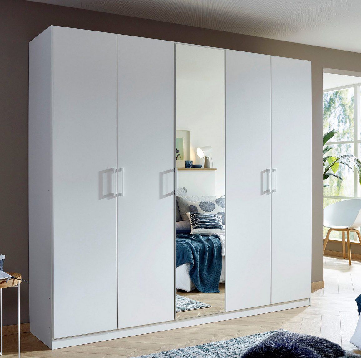 Rauch Orange Drehtürenschrank Thor inkl. Meshkorbeinsatz mit 2 Metallkörben & 2 Stoffboxen ab 359,99€ (statt 480€)