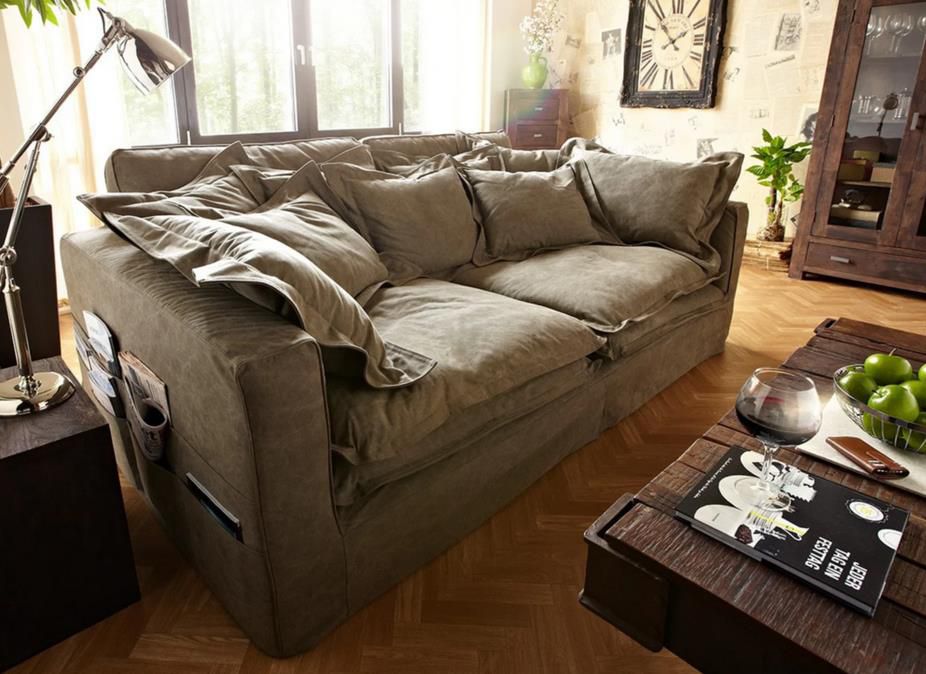 DeLife Noelia Hussensofa in Braun 240x145 cm mit Kissen für 1.599€ (statt 1.900€)