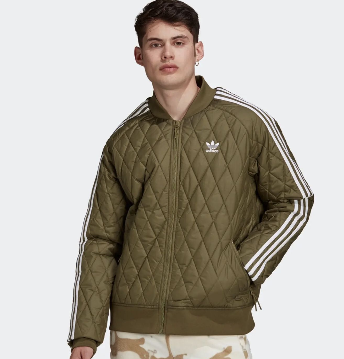 adidas adicolor gesteppte Trainingsjacke in Primegreen für 51,99€ (statt 80€)