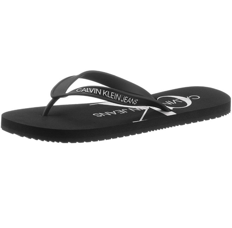 Calvin Klein Zehentrenner Beach Sandal Monogram Tpu in Schwarz oder Weiß für 20€ (statt 26€)