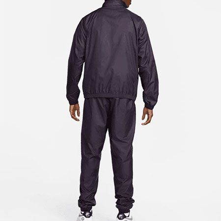 Nike Sportswear Club Lined Woven Trainingsanzug in 5 Farben für je 49,99€ (statt 64€)