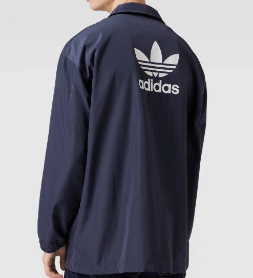 adidas Originals Jacke mit Haifisch Kragen in Marineblau für 29,99€ (statt 51€)