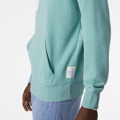 New Balance Essentials Pure Balance Hoodie in Türkis für 29,99€ (statt 70€)