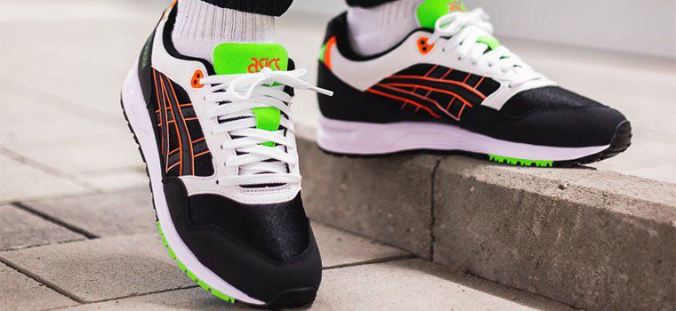 asics gel saga black shocking orange