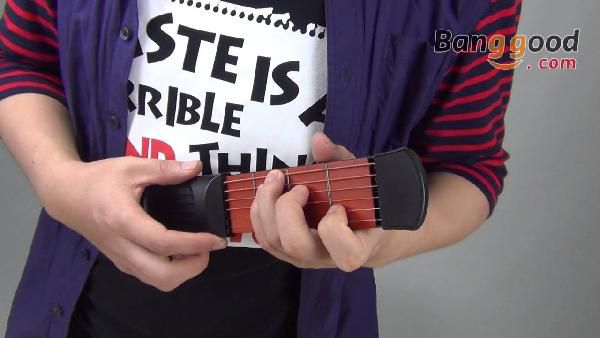 Gitarre für die Hosentasche - Pocket Guitar für 6,87€ Gitarre für die Hosentasche Pocket Guitar für 6,87€